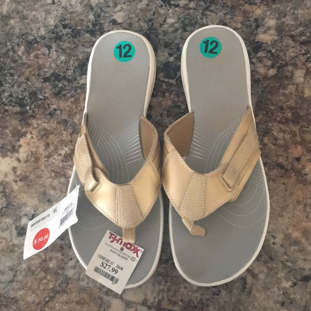 NWT Gold flip flops by Cloudsteppers by Clark’s